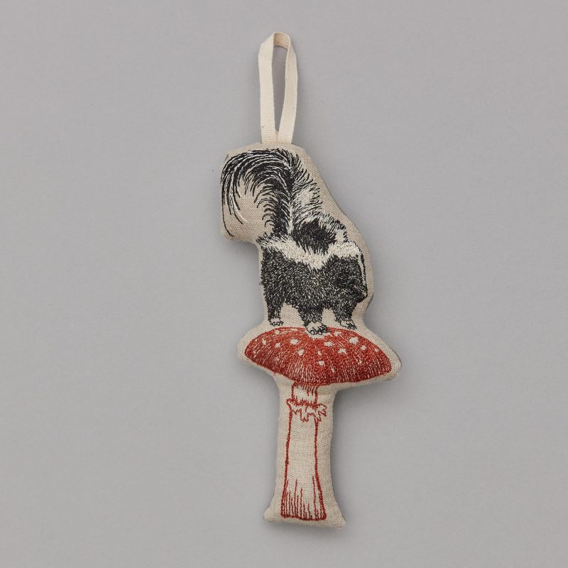 coralandtusk ornament skunk mushroom 1