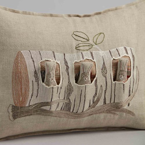 coralandtusk pillow aspen log bunnies 1detail