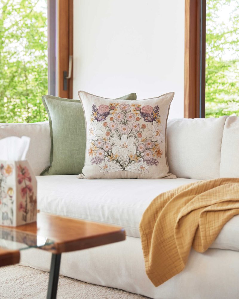 coralandtusk spring couch lilies daisies pillow